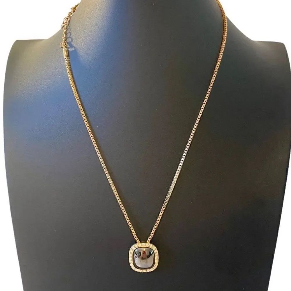 Lady Remington Brown Stone Pendant in Square setting surrounded by rhinestones.